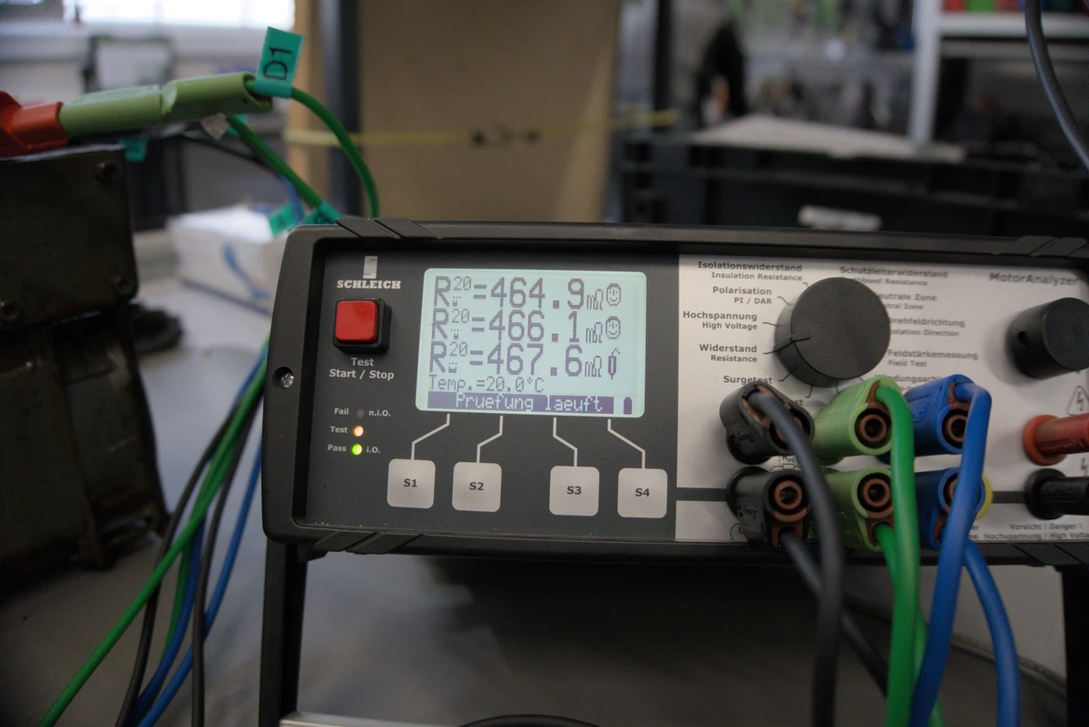 Measurement of motor bias voltage and recording in a test protocol.